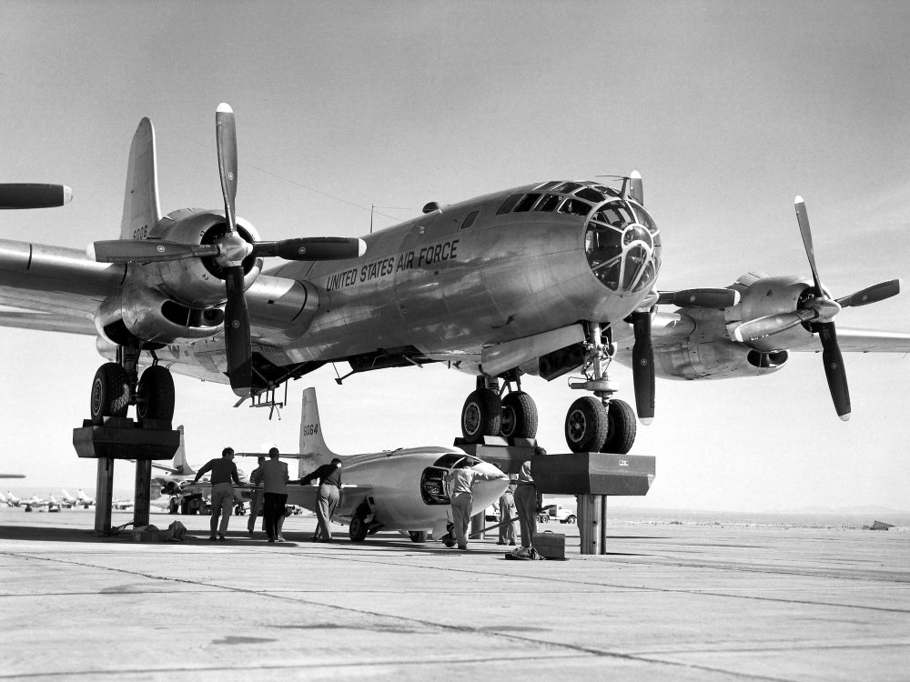 What was the designation of the post-World War II improved revision of the B-29 Superfortress, the bomber that famously carried the atomic bombs over Japan?