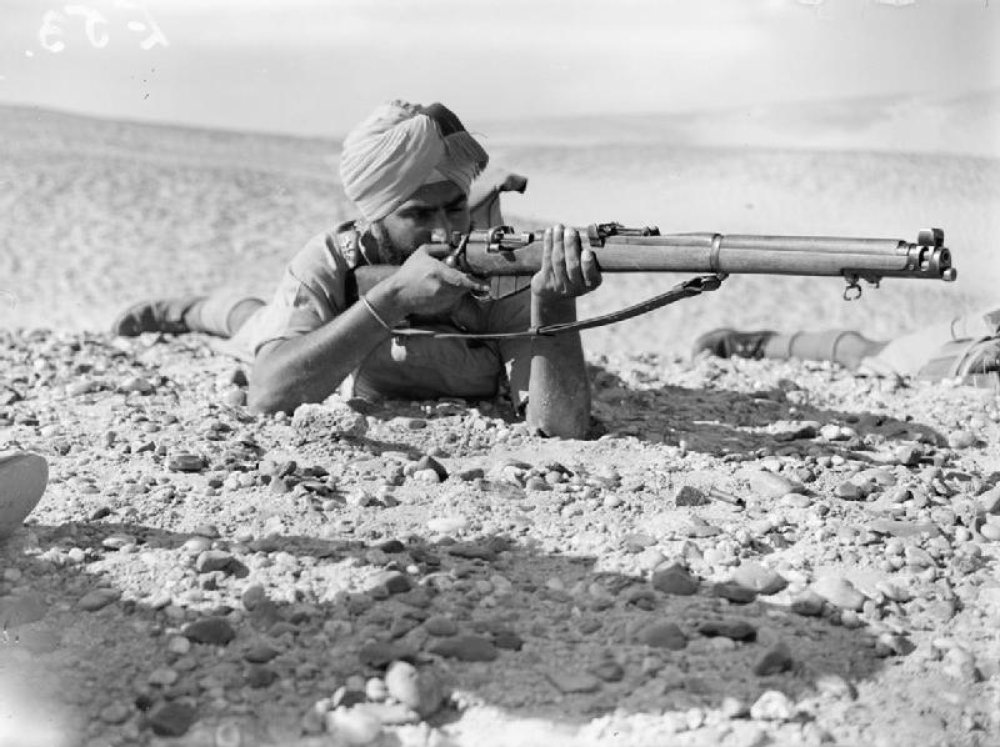 Can you identify the rifle in this photo taken during World War II?