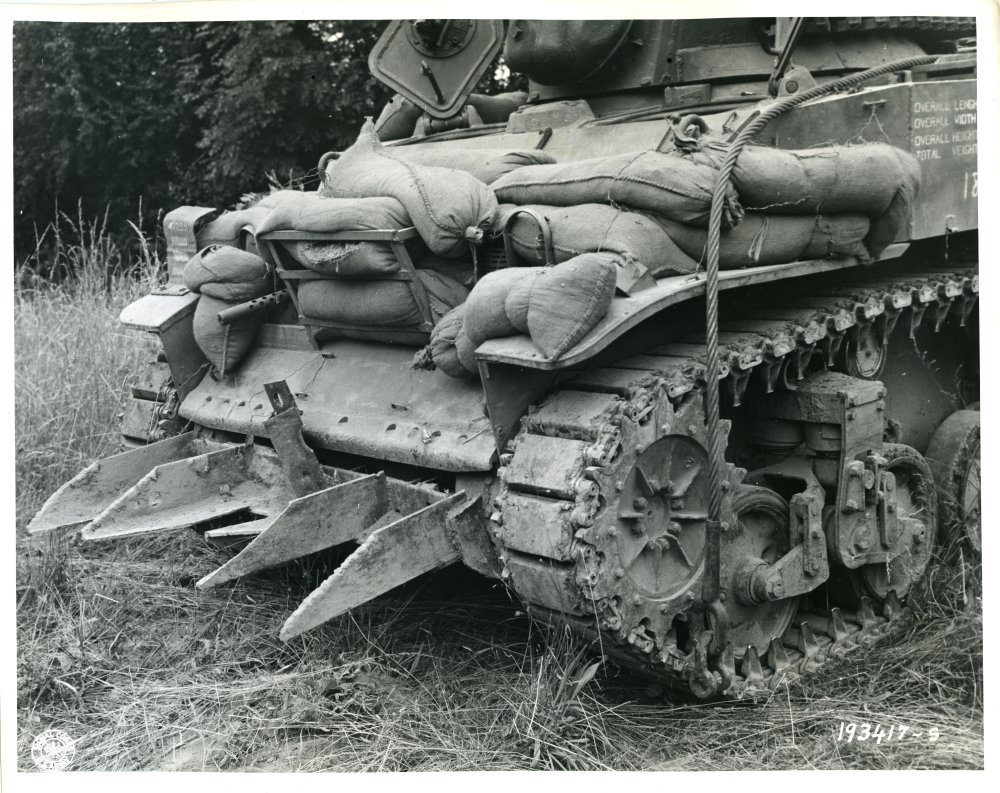 What was the common nickname for Allied tanks equipped with a tusk-like cutting apparatus used to make holes in the thick hedgerows of Normandy?