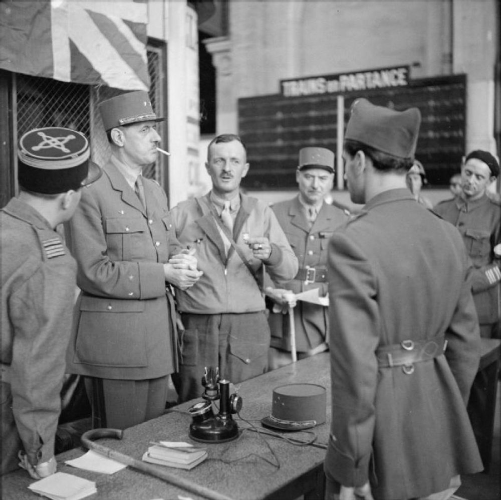 Charles de Gaulle, former leader of the Free French Forces and Chairman of the Provisional Government of the French Republic late in the war, resigned from the latter position in 1946 because he couldn’t get along with what group of people in the politics of the liberated country?