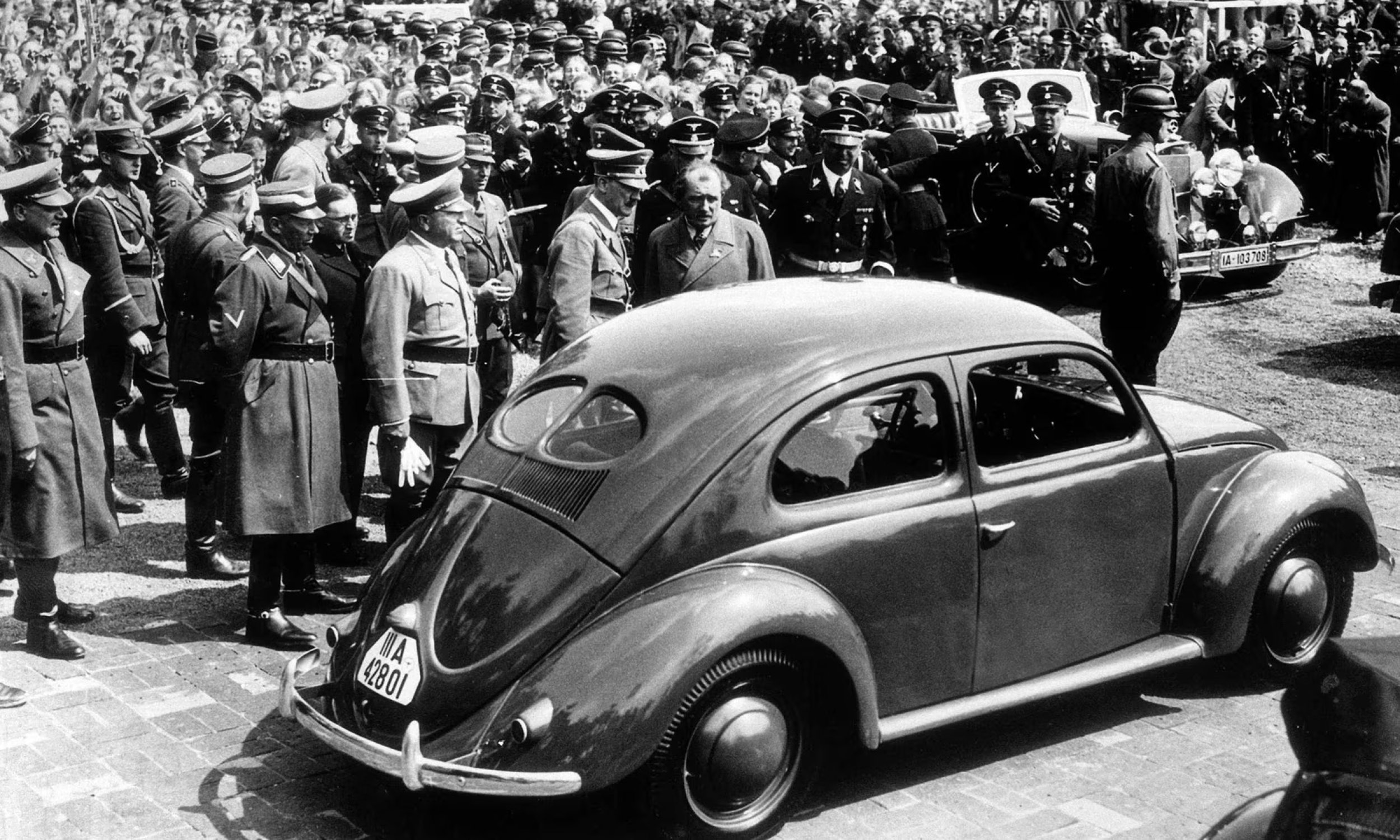 Who were responsible for keeping the Volkswagen car factory in operation after the end of World War II, giving the company a chance to become a globally recognized brand?